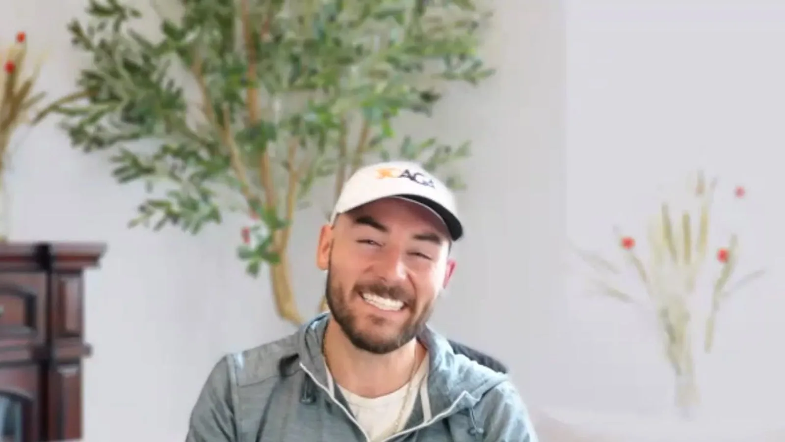 Clay smiling in a SCAGA cap while hosting an Amateur Edge interview.